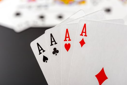 poker chips and cards on black background photo