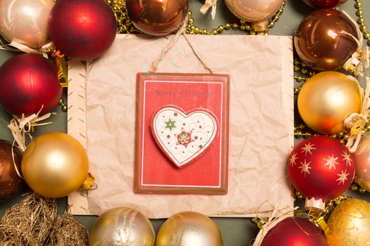 Greeting card mock up with christmas ornaments photo