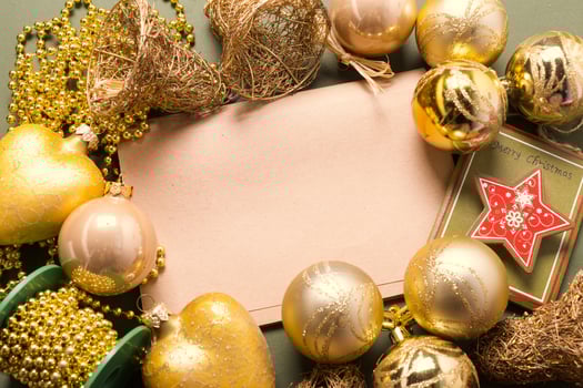 Greeting card mock up with christmas ornaments photo