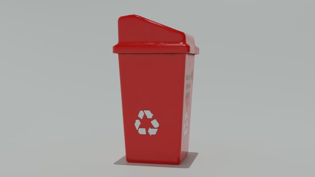 A red trash can with a recycling symbol on it photo