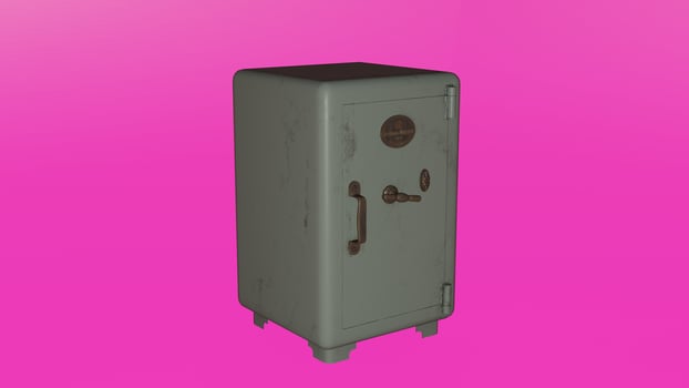 A metal safe on a pink background photo