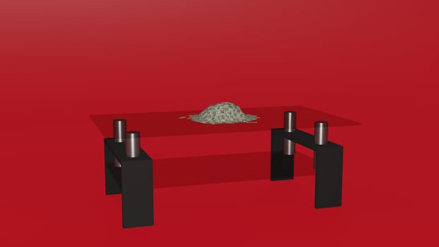 A table with a pile of sand on it photo