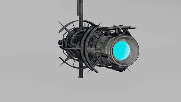 A large metal object with a blue light photo