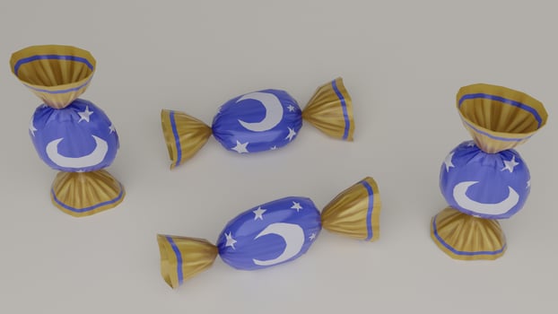 Three candy candies with stars and moon on them photo