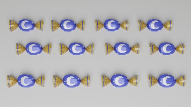 A set of blue and gold candies arranged in a row photo