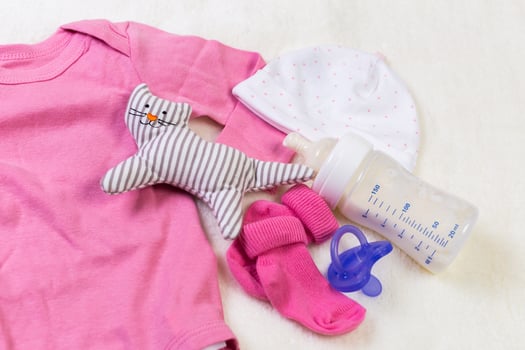 set of fashion trendy clothes and kids stuff for little baby girl photo