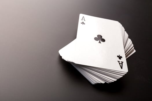 poker chips and cards on black background photo