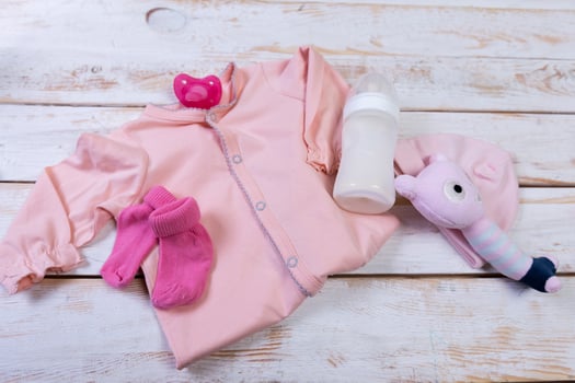 set of fashion trendy clothes and kids stuff for little baby girl photo