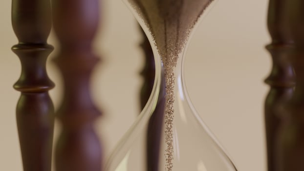 Hourglass with Sand Falling,Time Concept photo