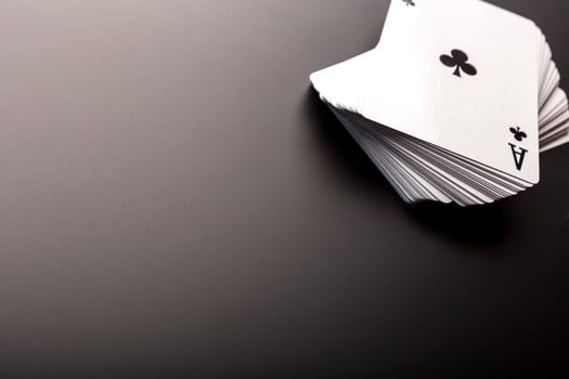 poker chips and cards on black background photo