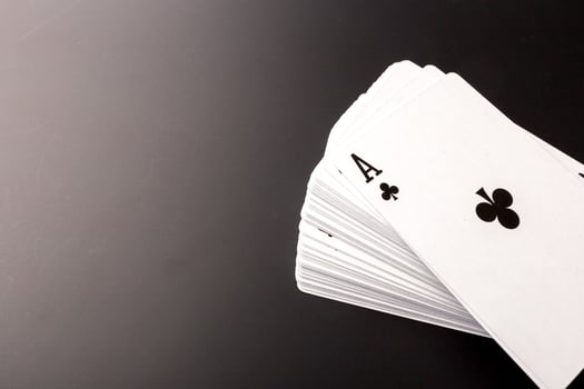 poker chips and cards on black background photo