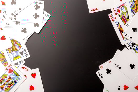 poker chips and cards on black background photo