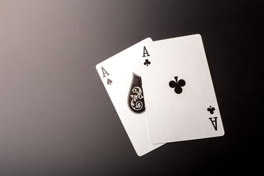 poker chips and cards on black background photo