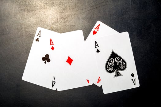 poker chips and cards on black background photo