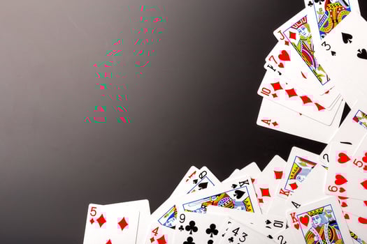 poker chips and cards on black background photo