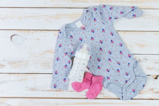set of fashion trendy clothes and kids stuff for little baby girl photo