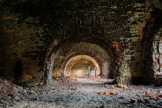 Inside old ruined burnt red brick fortress photo