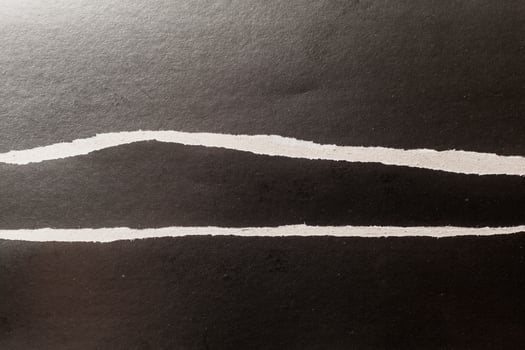 black ripped paper photo