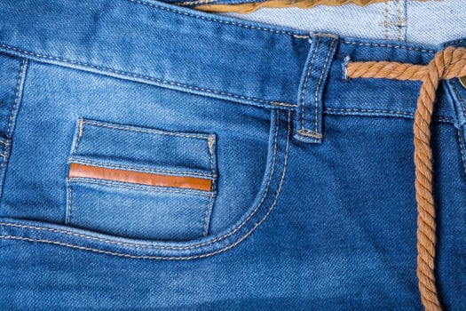 Detail of blue jeans photo