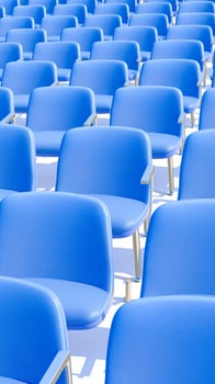 rows blue chairs a minimalist design photo