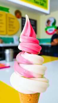 pink white soft serve ice cream cone photo