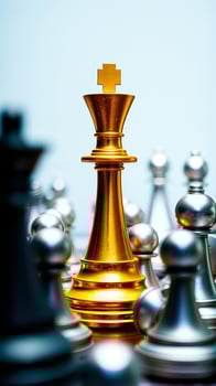 golden chess king surrounded by silver pawns photo