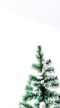 decorated pine branch with white bells photo