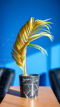 golden palm leaf a marble pot photo