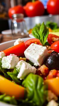 close- a salad with white cheese tomatoes basil photo