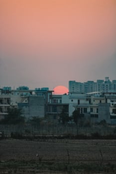 Urban Sunset Over City Buildings photo