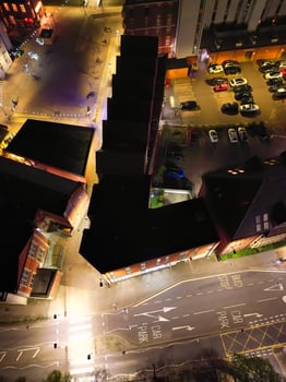 Aerial View of Illuminated Central Bedford City of England United Kingdom During Night. April 5th, 2024, High Angle Footage Was Captured after Sunset and Beginning of Night with Drone's Camera photo