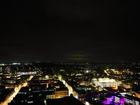 Aerial View of Illuminated Central Bedford City of England United Kingdom During Night. April 5th, 2024, High Angle Footage Was Captured after Sunset and Beginning of Night with Drone's Camera photo