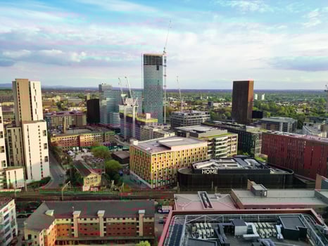 Aerial View of Greater Manchester City Centre and Tall Buildings During Golden Hour of Sunset. England UK. May 5th, 2024, High Angle Footage Was Captured with Drone's Camera photo