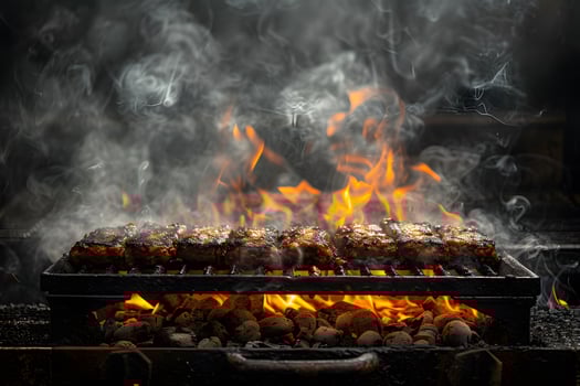Grilled Ribs Over Open Flame with Smoke and Coals photo