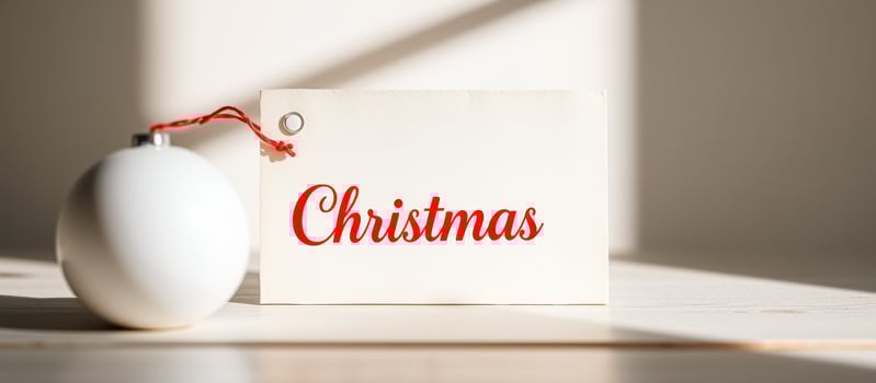 white christmas ornament card on a table photo