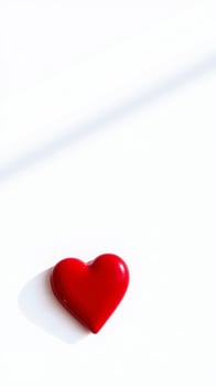 red heart on a white background photo