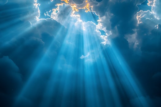 Celestial Sunbeams Filtering Through Majestic Clouds in a Serene Sky photo