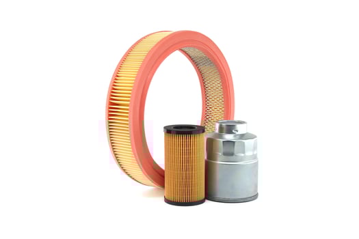 Variety of filters including air filter, oil filter, and fuel filter isolated on white background photo