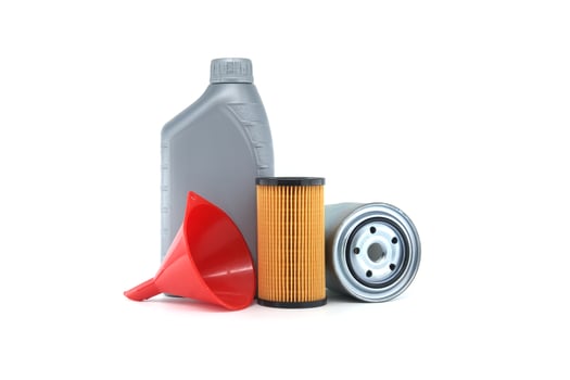 Auto Maintenance Supplies Including Oil Filter and Funnel photo