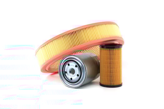Car engine filters assortment including air filter, oil filter and fuel filter isolated on white photo
