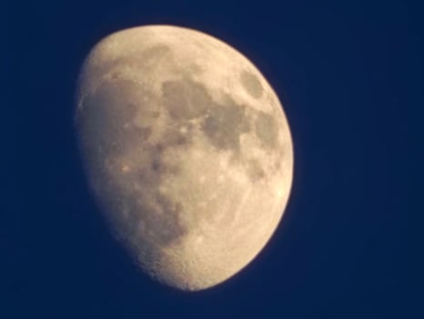 The moon is seen from the sky photo