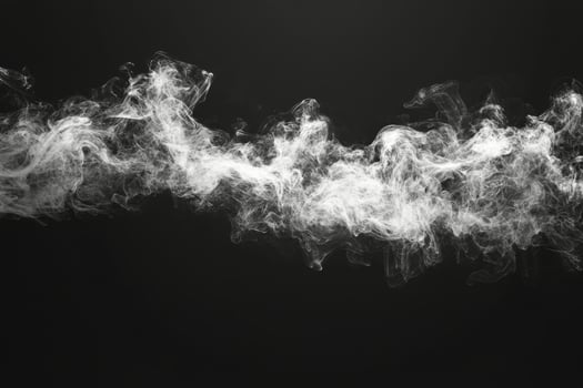 White smoke swirling against a dark background, creating an abstract and atmospheric effect photo
