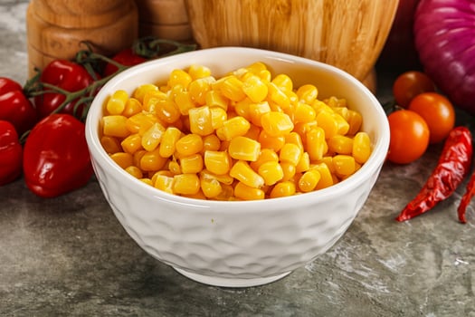 Sweet canned ripe corn grain photo