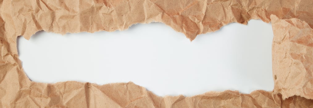 Torn crumpled craft paper for packaging. Copy space photo