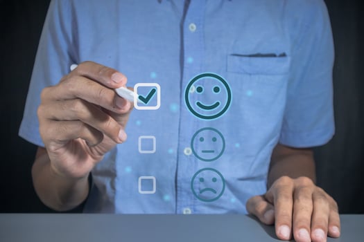 Man gives rating to service experience on virtual screen. Customer review satisfaction feedback concept. photo