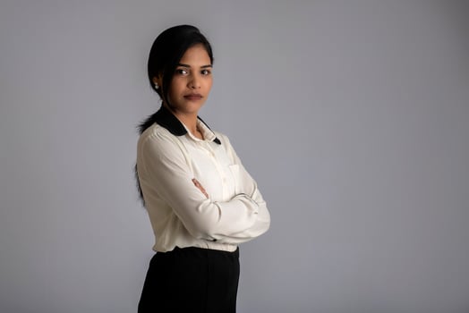 Portrait of a young girl woman posing on gray background photo