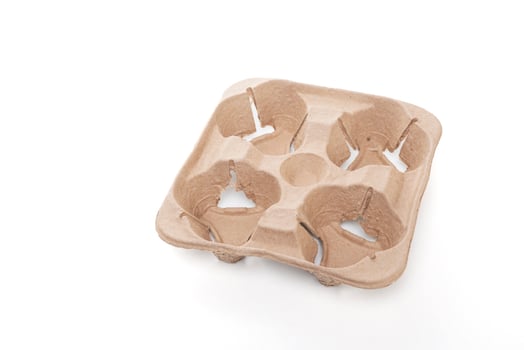 Craft holder for 4 glasses. Cardboard drink holder isolated on white background photo