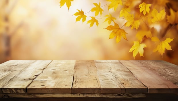 Beautiful colorful natural autumn background for presentation. Fallen dry orange leaves on wooden boards against the backdrop of a blurry autumn park. photo