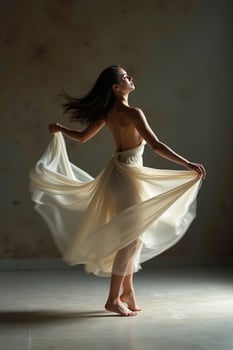 A woman in a white dress is dancing photo
