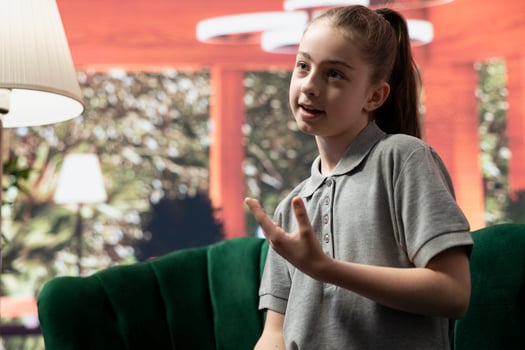 Teenage girl in therapy discussing the impact of cyberbullying on her mental wellbeing. Psychologist offering advice on managing anxiety, low confidence and emotional challenges. photo